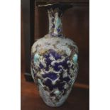 Decorative baluster shaped relief decorated gilded and polychrome vase. (B.P. 24% incl.