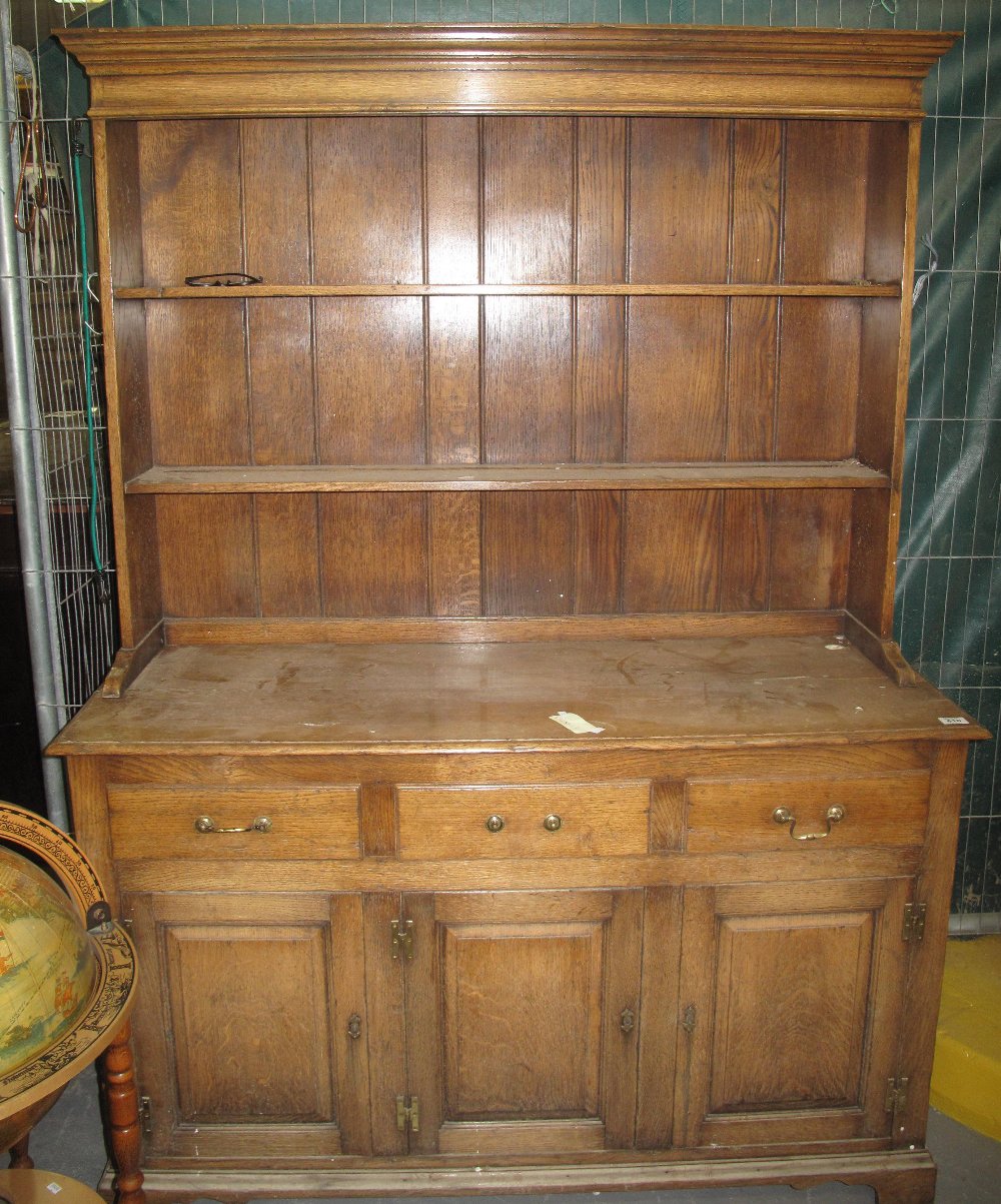 Gwilym C. Price & Son oak rack back dresser. No estimate, no reserve. Water damaged. (B.P. 24% incl.