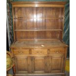 Gwilym C. Price & Son oak rack back dresser. No estimate, no reserve. Water damaged. (B.P. 24% incl.