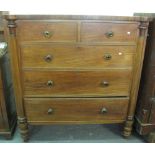 19th Century mahogany straight front chest of two short and three long drawers with glass handles.