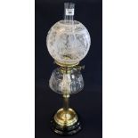 Early 20th Century brass double burner oil lamp with clear cut glass reservoir,