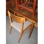 Mid 20th Century teak dining room suite to include; sideboard, table and four chairs. (B.P.
