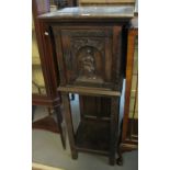 17th Century style oak cupboard on stand with under tier,