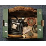 Box of oddments including; inkwell, brass compass, magnifying glass, miniature clock, desk stand,