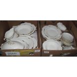 Two boxes of Royal Crown Derby English bone china 'Regency' design tea and dinnerware items,