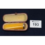 Cased amber cigar holder with gold collar. (B.P. 24% incl.