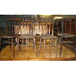 Pair of late 19th/early 20th Century elm slat backed farmers kitchen chairs,