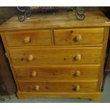 Modern pine bedroom straight front chest of two short and three long drawers on bracket feet. (B.P.