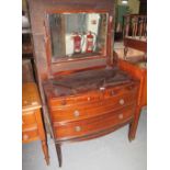 Early 20th Century mahogany bow front mirror back dressing table/chest of drawers on splay legs.