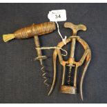 19th Century wooden handled corkscrew with steel helix and hair brush,