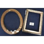 Two large silver photograph frames, oval and rectangular. (2) (B.P. 24% incl.