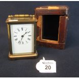 Early 20th Century French brass carriage clock with full depth Roman face and leather covered