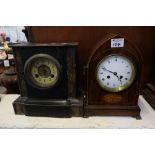 Edwardian inlaid rosewood two train lancet shaped mantel clock with Roman enamel face on brass feet,