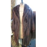 Vintage brown knee length fur coat (probably Musquash). (B.P. 24% incl.
