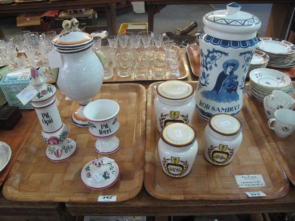 Two trays of reproduction apothecary jars and similar vessels with various text,