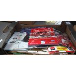 Small box of assorted rugby programmes, club and international,