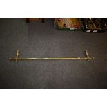 Brass mantel piece rail with vase shaped mounts. (B.P. 24% incl.