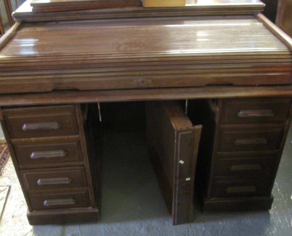 Early 20th century mahogany tambour fronted, twin pedestal, knee hole desk. (B.P. 24% incl.