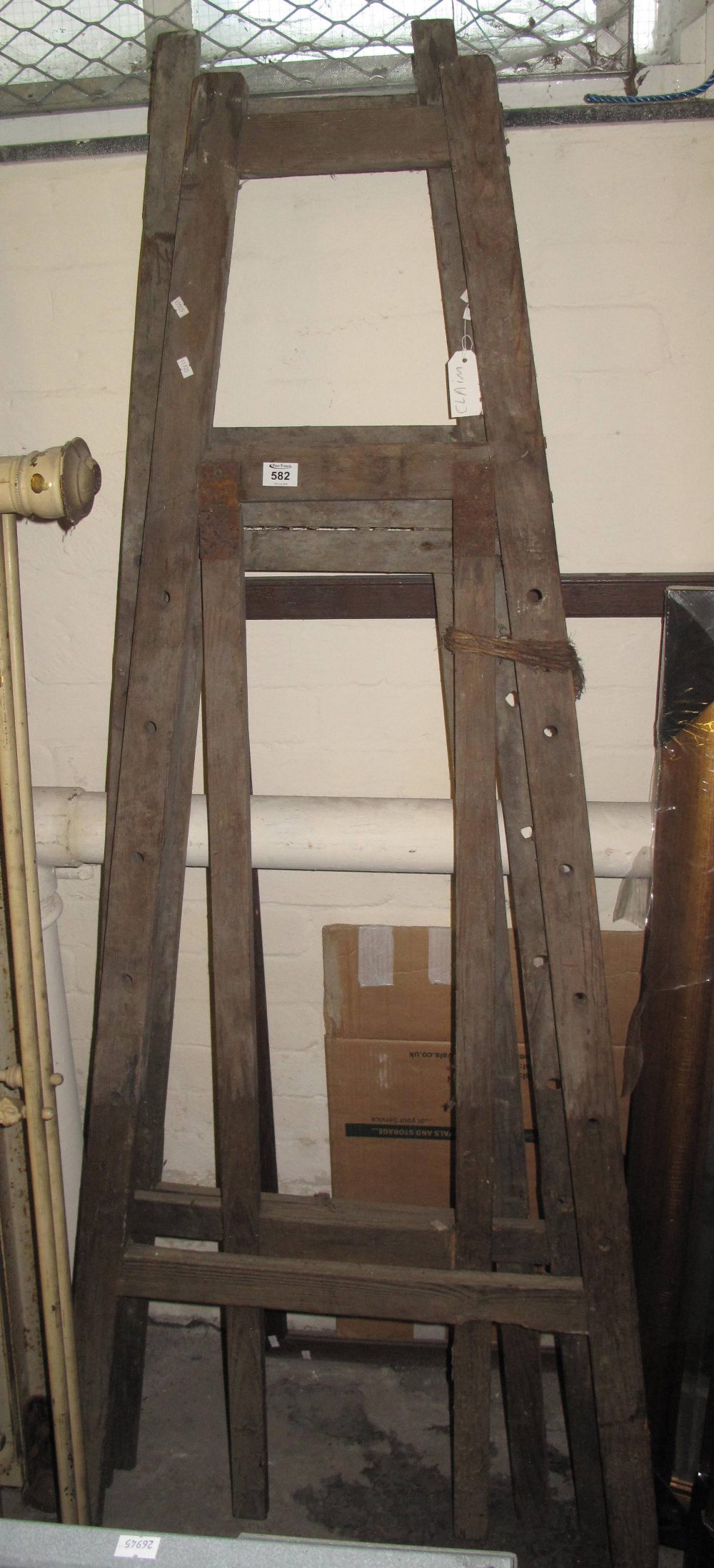 Two vintage artists easels. No reserve, no estimate. Water damaged. (B.P. 24% incl.