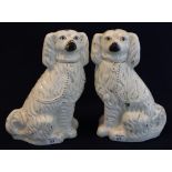 Large pair of late 19th Century Staffordshire pottery seated spaniels over gilded with painted