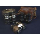 Pair of plated and leather covered opera glasses in leather case,