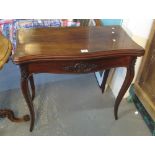 Edwardian mahogany serpentine fronted card table on outswept legs. (B.P. 24% incl.