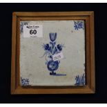 18th Century blue and white tin glazed Delft pottery tile with vase of flowers decoration,