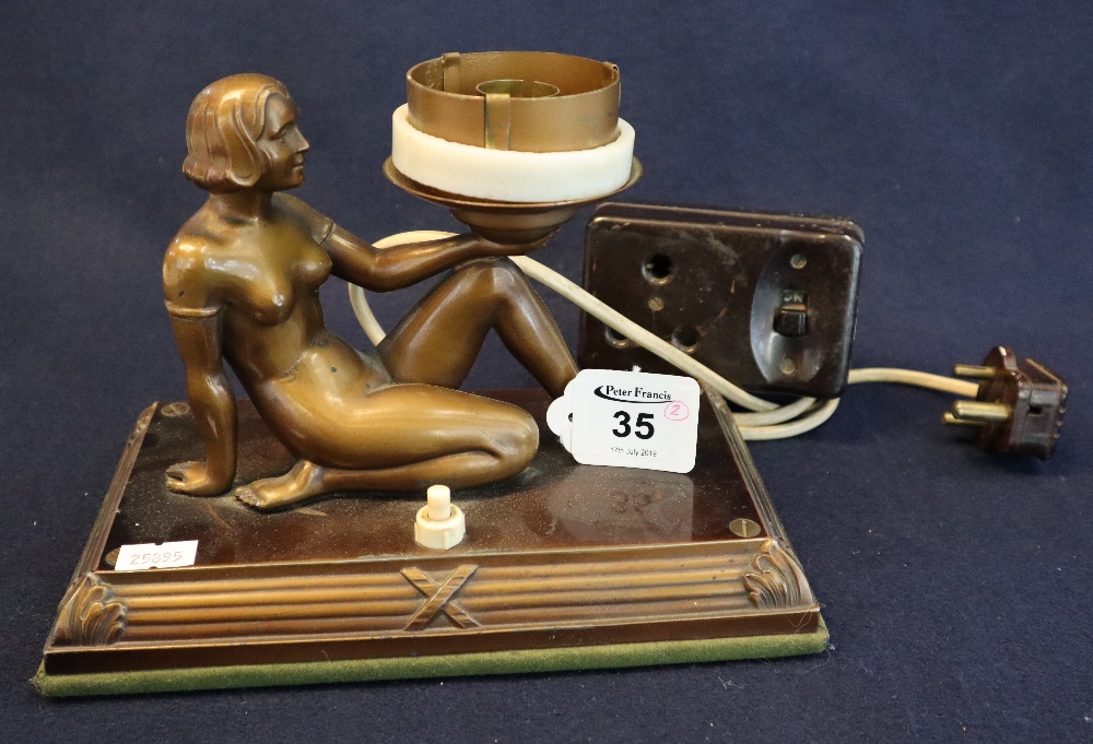 Art Deco design bronzed metal figural table lamp with seated nude female figure on rectangular