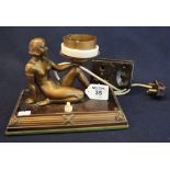 Art Deco design bronzed metal figural table lamp with seated nude female figure on rectangular