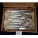 Set of six silver dessert knives and forks with mother of pearl handles. (B.P. 24% incl.