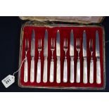 Cased set of silver dessert knives and forks with mother of pearl handles. (12) (B.P. 24% incl.