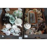 Two boxes of assorted china to include; bullet shaped and other teapots, Royal Doulton trays,