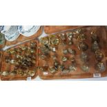 Two trays of brass novelty bells in the form of Welsh ladies, windmills etc. (2) (B.P. 24% incl.