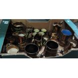 Box of assorted Wade and other copper lustre dresser jugs, coffee cups, cream jugs etc. (B.P.