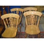 Set of four beech spindle and slat backed kitchen chairs. (4) (B.P. 24% incl.