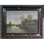 J Schreuder, Dutch canal scene with cottages and windmills, signed and dated '25, oils on board.