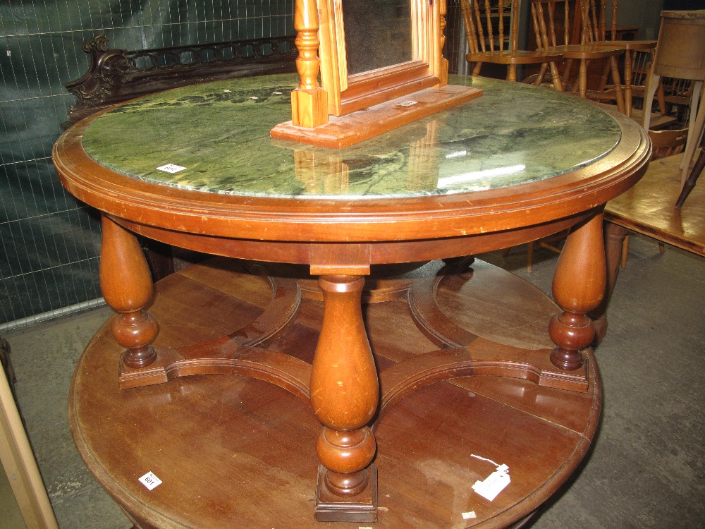 Modern hardwood circular centre or coffee table with simulated marble top. (B.P. 24% incl.