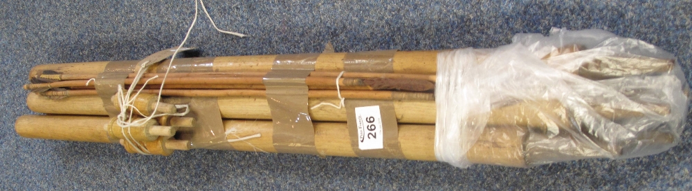 Set of vintage cricket stumps with bailes, together with three appearing Asian wooden arrows. (B.P.