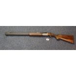 Rottweil double barrelled over and under 12 bore shotgun,