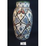 Late 19th/early 20th century Isnik design glazed pottery ovoid shaped vase with stylized foliate