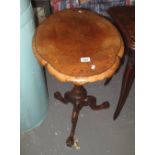 Victorian walnut inlaid oval tripod table. (B.P. 24% incl.