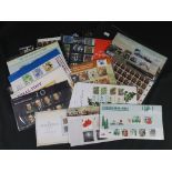 Great Britain selection of presentation packs. 1976 collectors pack and various stamps in blocks.