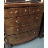 Victorian mahogany bow front chest of two short and three long drawers on baluster turned legs. (B.