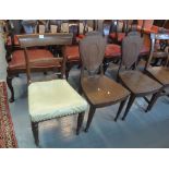 Pair of Victorian mahogany shield back hall chairs,