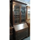 Early 20th Century oak two stage bureau bookcase with stained glass leaded glazed panels. (B.P.