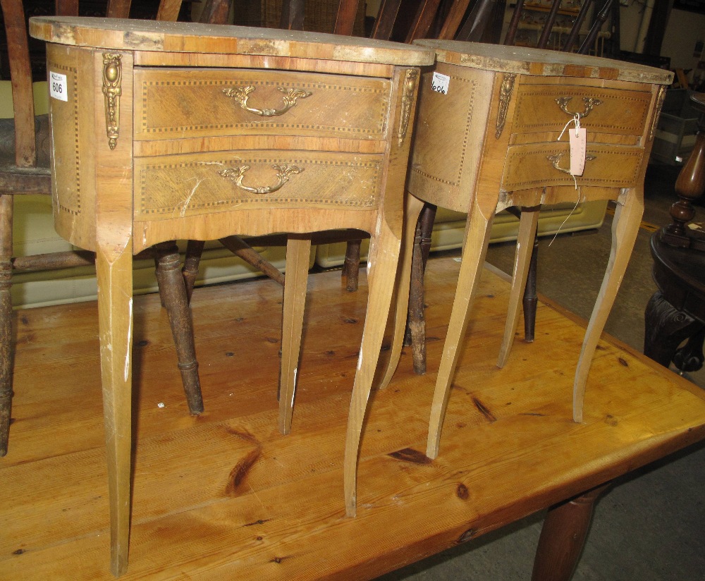 A pair of French design kidney shaped bedside two drawer tables. No estimate, no reserve.