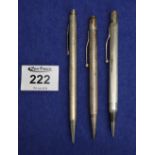 Three silver propelling pencils. (B.P. 24% incl.