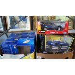 Box containing 1:18 and 1:19 scale diecast model vehicles in original boxes,