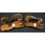 Pair of platform wooden Indian Paduka sandals, one plain and one in fish shape inlaid with wire.