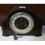 Mid 20th Century oak hat shaped two train Smiths mantel clock. (B.P. 24% incl.